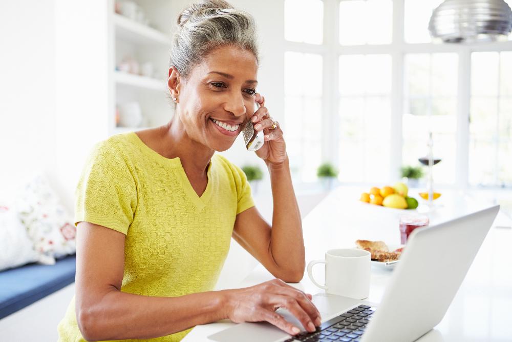 wellesley woman making a dental appointment on the phone