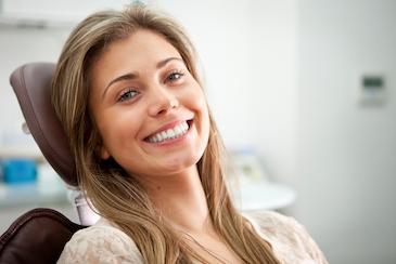 woman smiling in dental chair