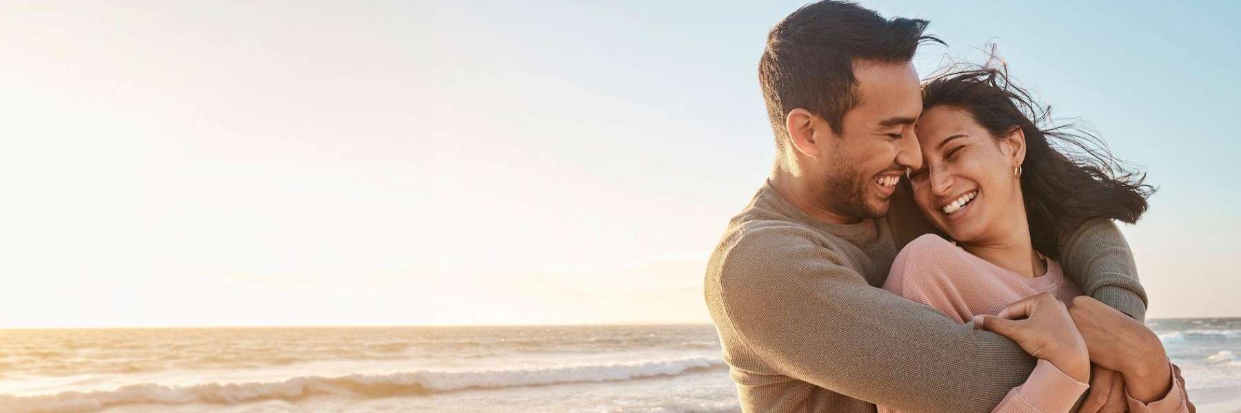 A couple smiling after getting Dental Care in Wellesley Hills, MA