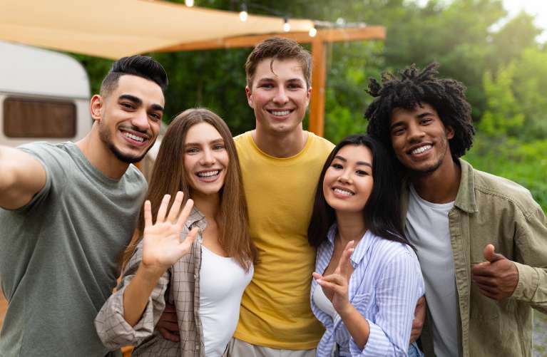 group of friends taking a picture in wellesley